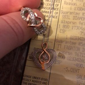 Diamond in motion necklace and matching ring